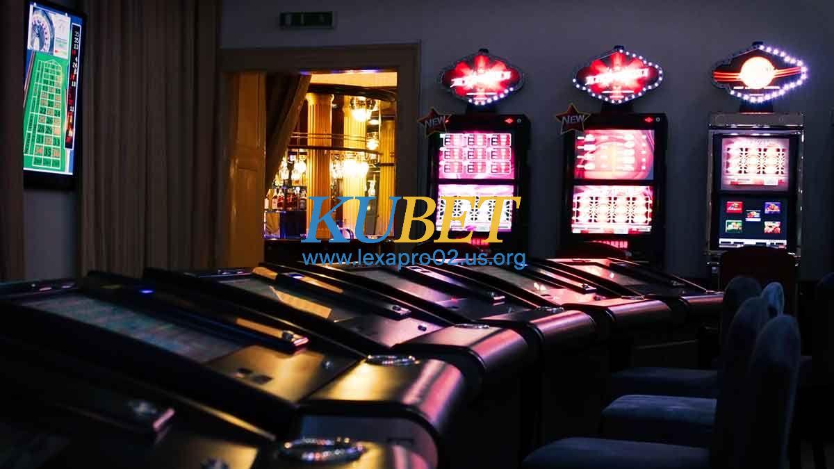 A room with casino machines and slots machines